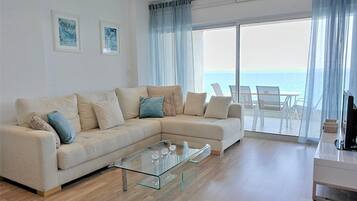 Luxury Apartment, 2 Bedrooms, Sea View (Horizon) | Living room | Flat-screen TV, toys