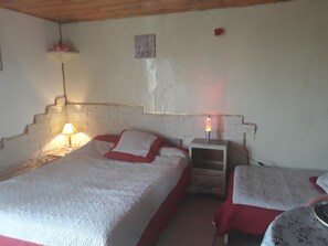 Desk, laptop workspace, iron/ironing board, free cots/infant beds