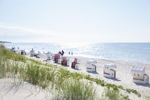 On the beach, white sand