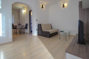 Apartment (Vili A2+2) | Living area | TV - Vili (Novigrad)