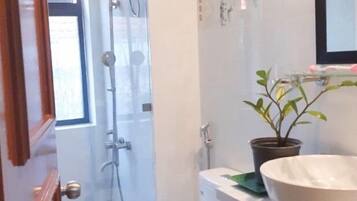 Basic Room, 1 Queen Bed, Smoking | Bathroom | Shower, free toiletries, slippers, bidet
