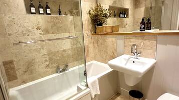 Hair dryer, towels, soap, shampoo