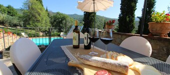 Ancient stone hamlet in an extremely panoramic position overlooking the wooded Val di Chio. Private