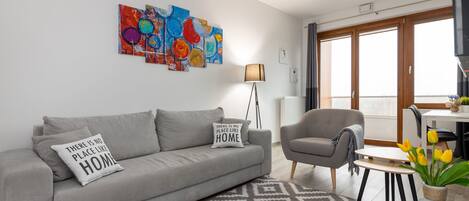Comfort-Apartment | Wohnzimmer | 30-Zoll-Flachbildfernseher mit Kabelempfang, Fernseher