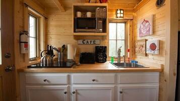 Fridge, microwave, coffee/tea maker, toaster
