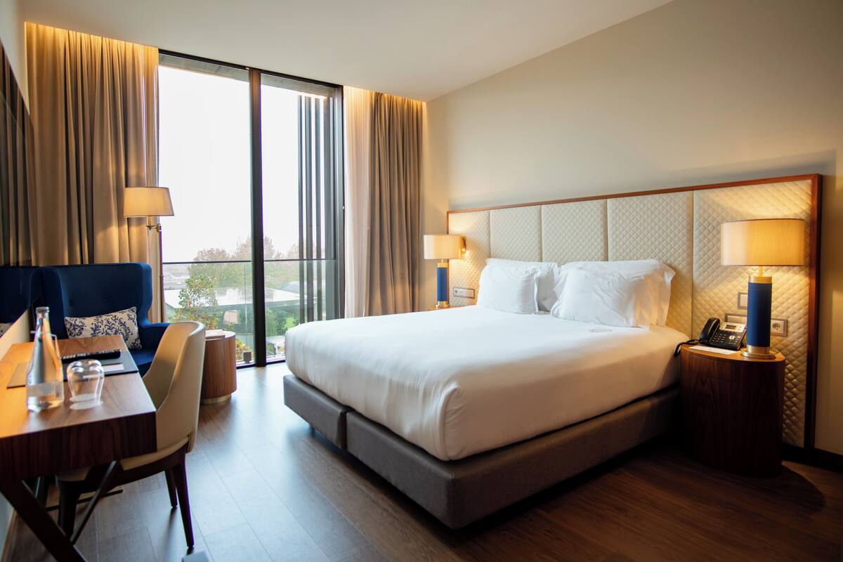 In-room safe, desk, laptop workspace, blackout curtains