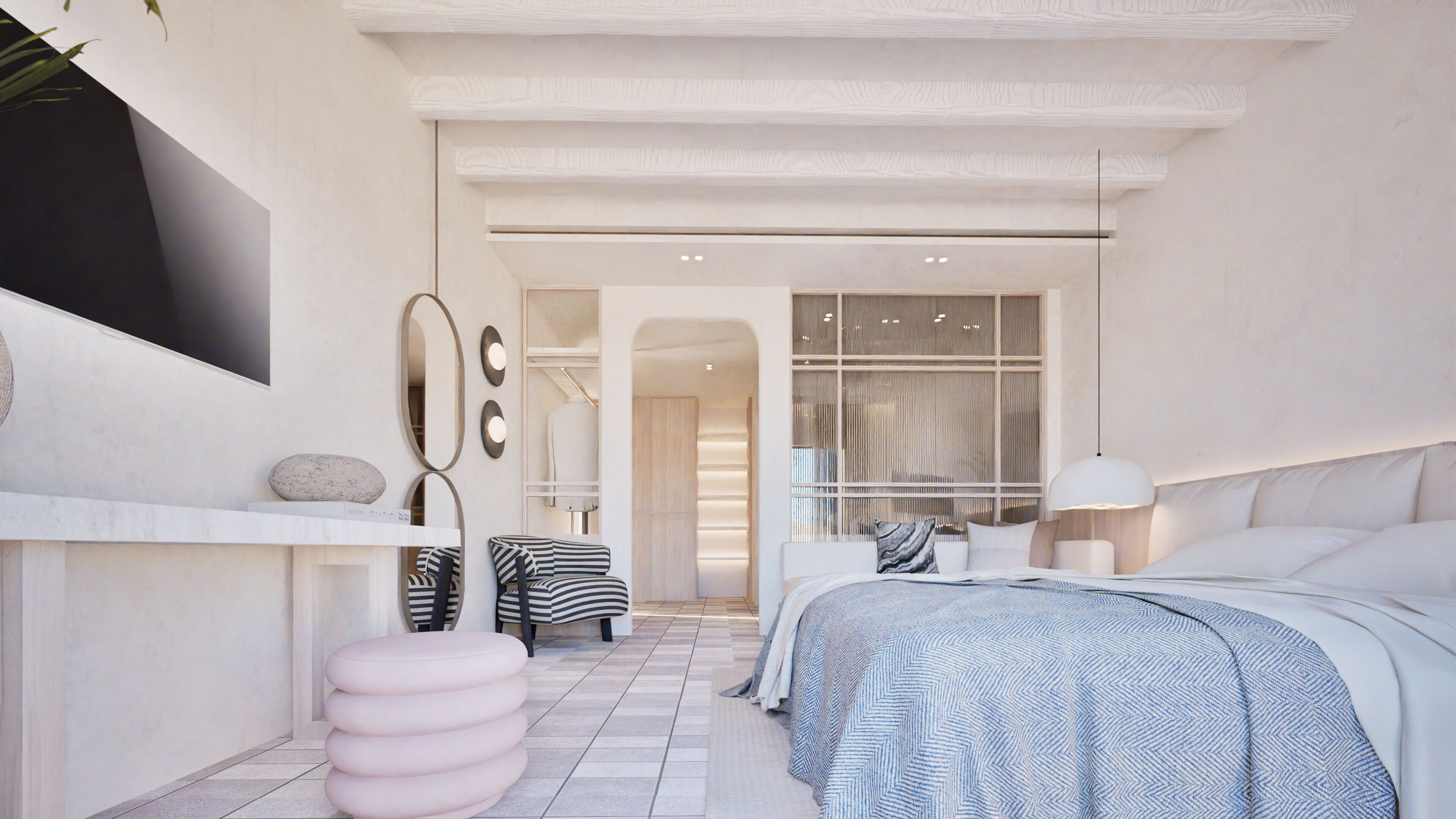 Un dormitorio moderno con cama, mesitas de noche, un espejo y una zona de estar.