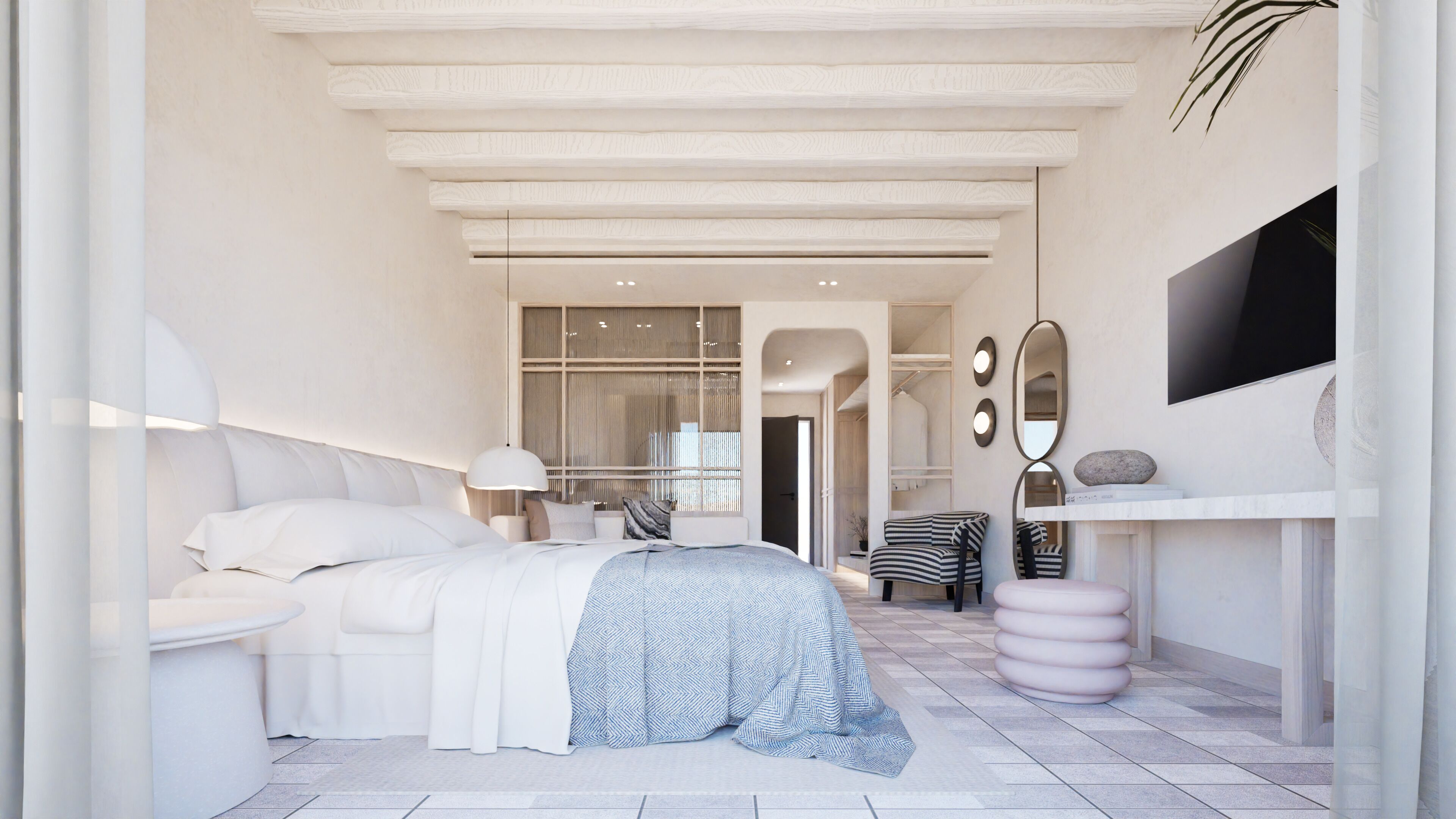 Un dormitorio moderno con cama, mesita de noche, lámpara y un espejo grande.
