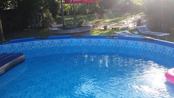 Seasonal outdoor pool, pool umbrellas, sun loungers