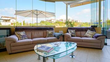 Villa | Living area | Flat-screen TV, DVD player