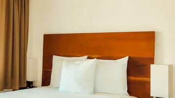 Habitación Premium, vistas al lago | Wifi gratis y ropa de cama