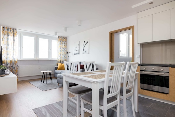 Superior Apartment | Living room | 30-inch flat-screen TV with cable channels, TV