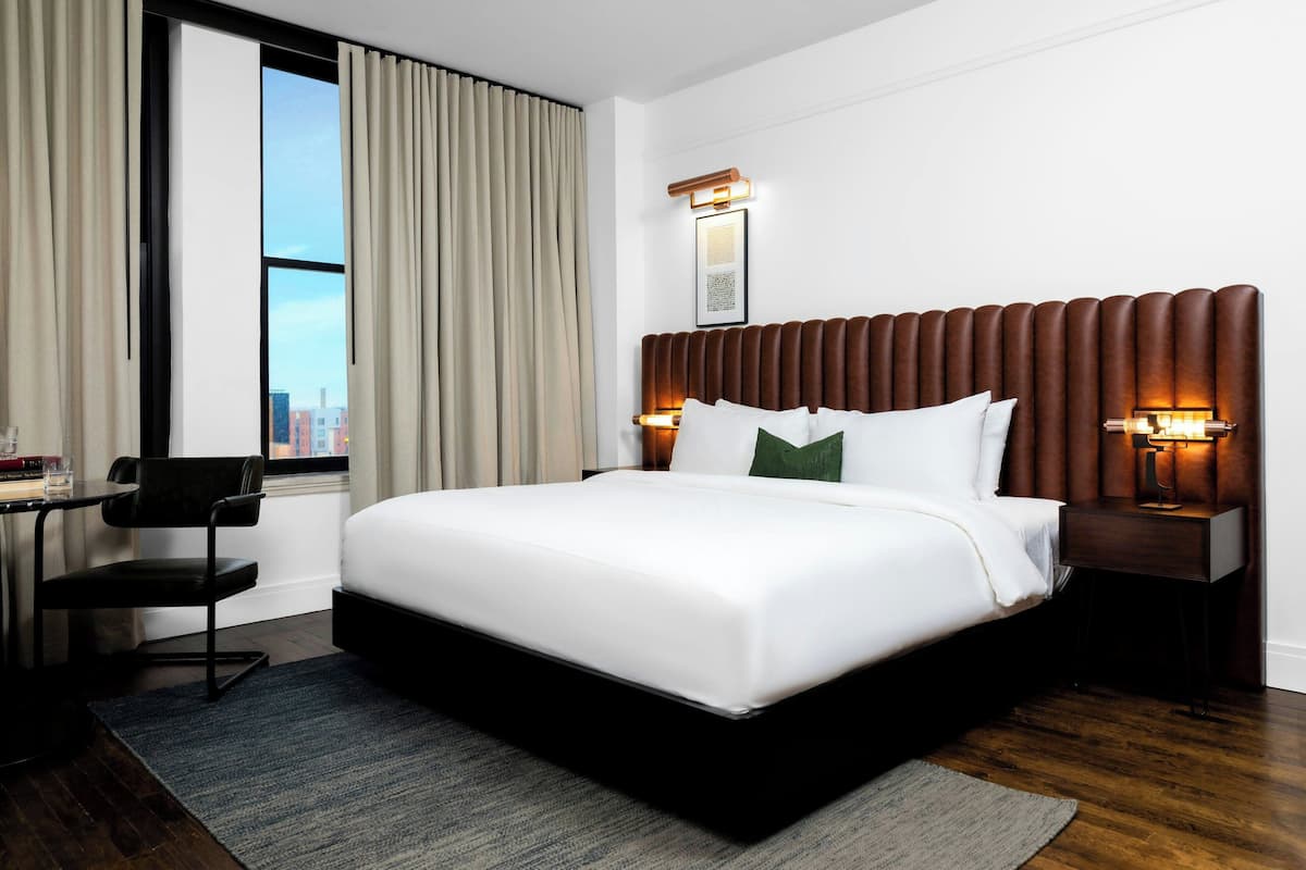 Premium bedding, down comforters, minibar, in-room safe