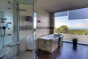 Bathtub, hair dryer, towels