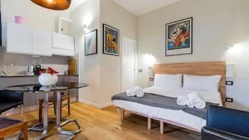 Exclusive Studio Suite | Desk, laptop workspace, iron/ironing board, cribs (free)