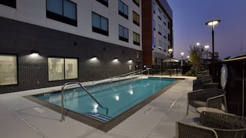 Outdoor pool, open 8:00 AM to 10:00 PM, sun loungers