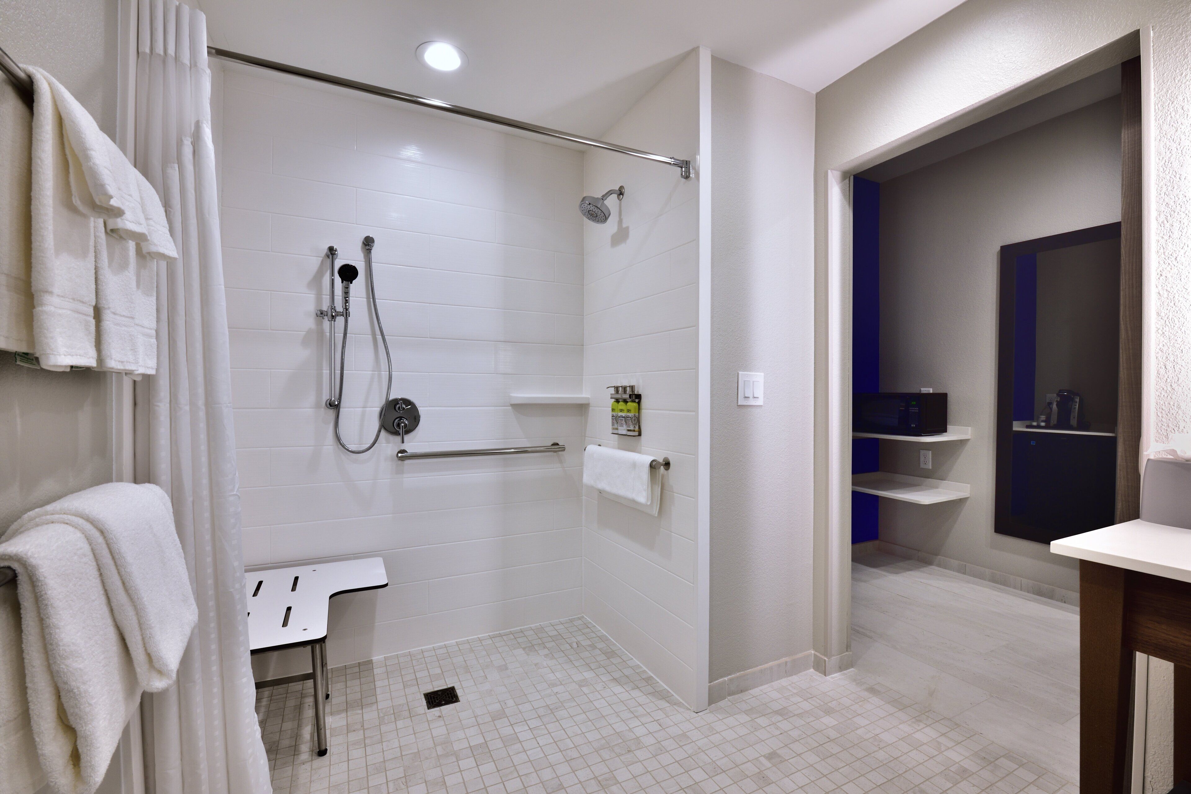 suite, 1 king bed, roll-in shower (mobility, roll-in shower) | 1 bedroom, in-room safe, desk, laptop workspace