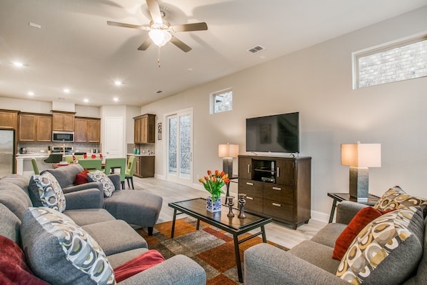 City Townhome | Living area | 40-inch TV with cable channels