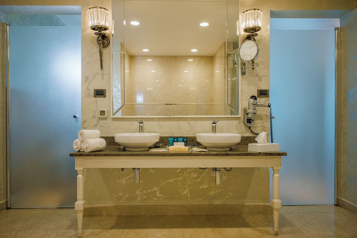 royal suite, 1 king bed | bathroom | free toiletries, hair dryer, slippers, bidet
