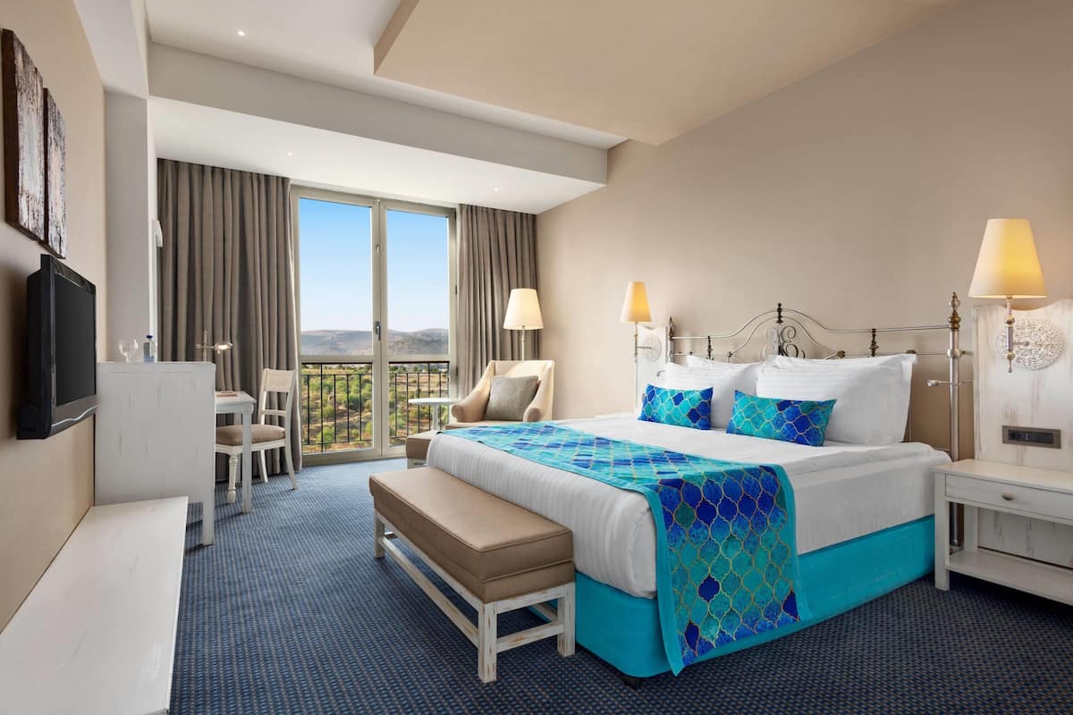 Suite, 1 King Bed | 1 bedroom, premium bedding, minibar, in-room safe