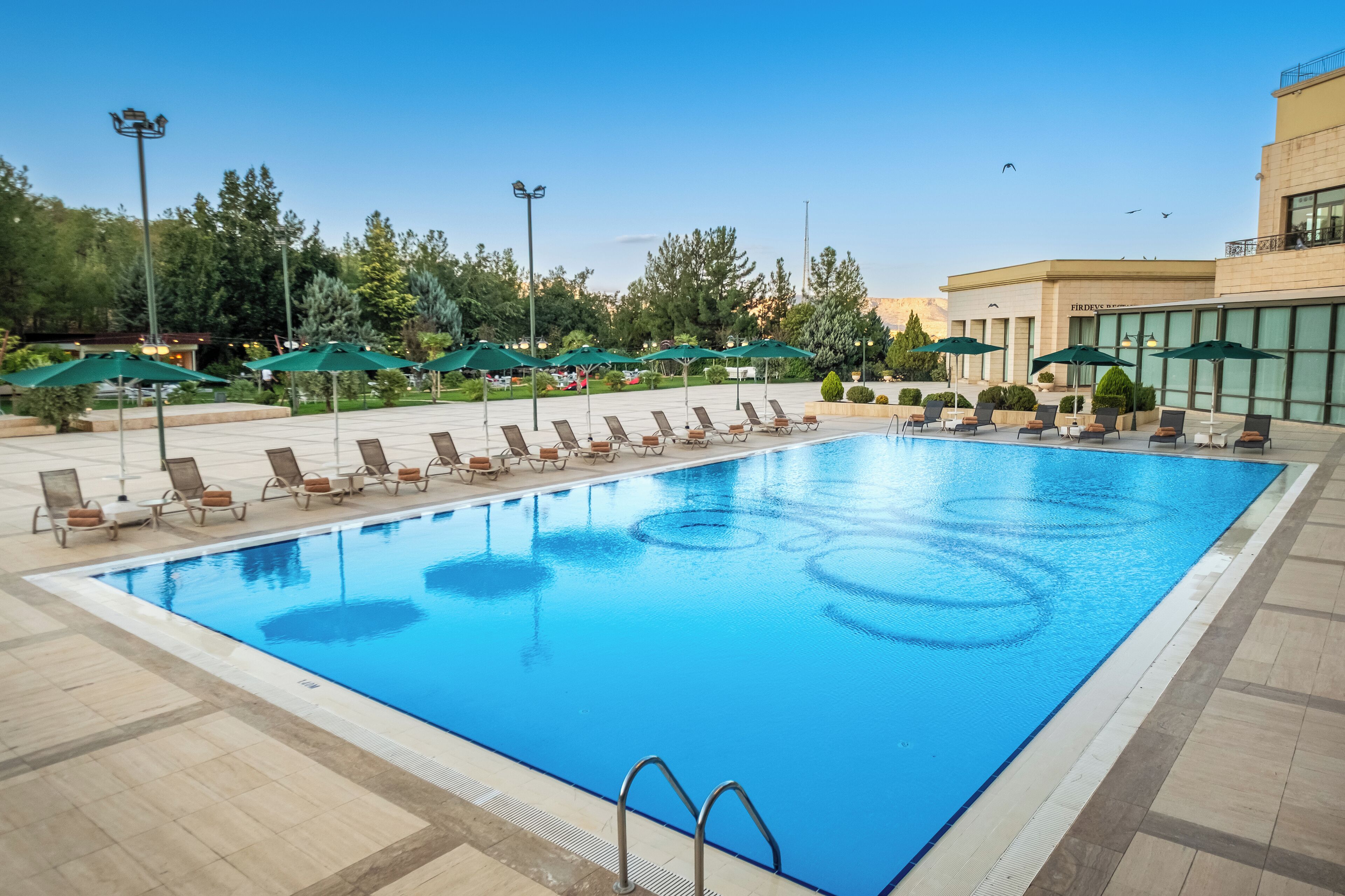 indoor pool, outdoor pool, open 10:00 am to 11:00 pm, pool loungers