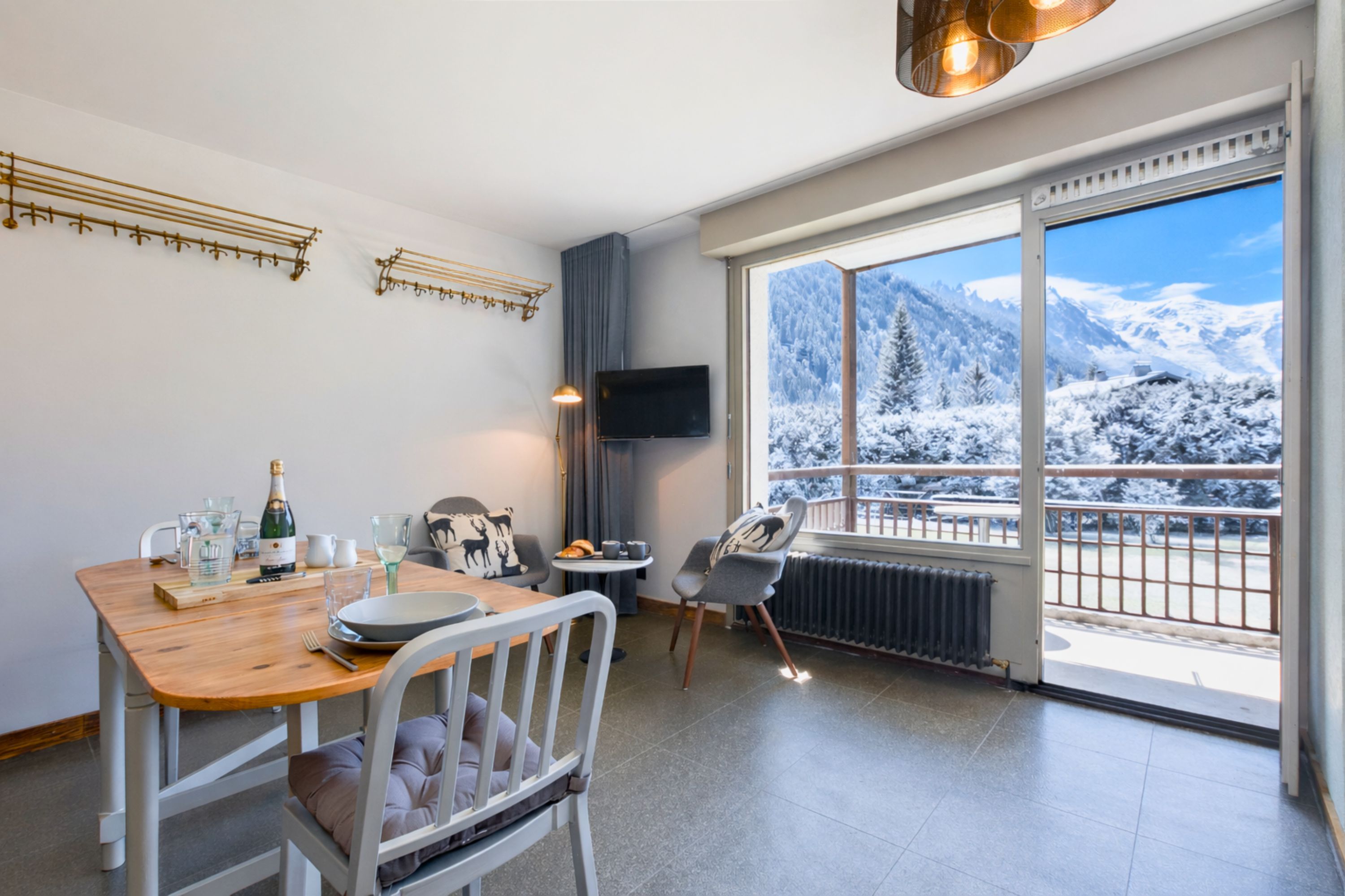 Dining area with access to a sunny balcony