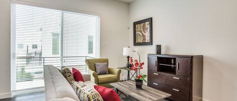 City Townhome | Living area | 40-inch LCD TV with cable channels, TV