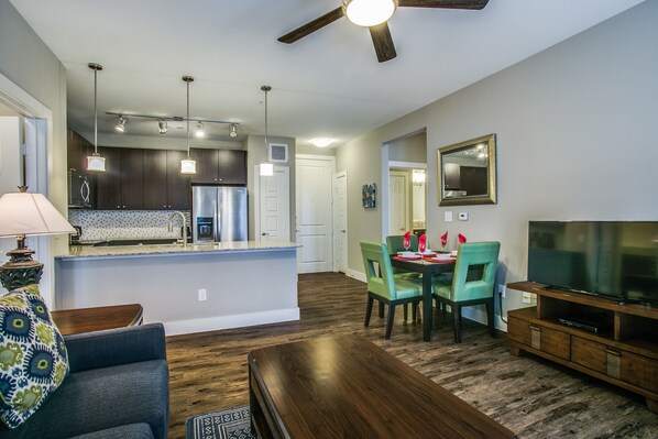 City Apartment | Living area | 40-inch LCD TV with cable channels, TV