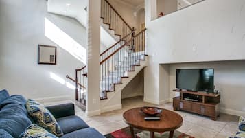 City Townhome | Living area | 40-inch LCD TV with cable channels, TV