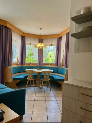 Deluxe Apartment, 2 Bedrooms (Silvia) | Living area | Flat-screen TV - Wellness Residence Panorama - Check-in at  Olympia Hotel (Livinallongo del Col di Lana)