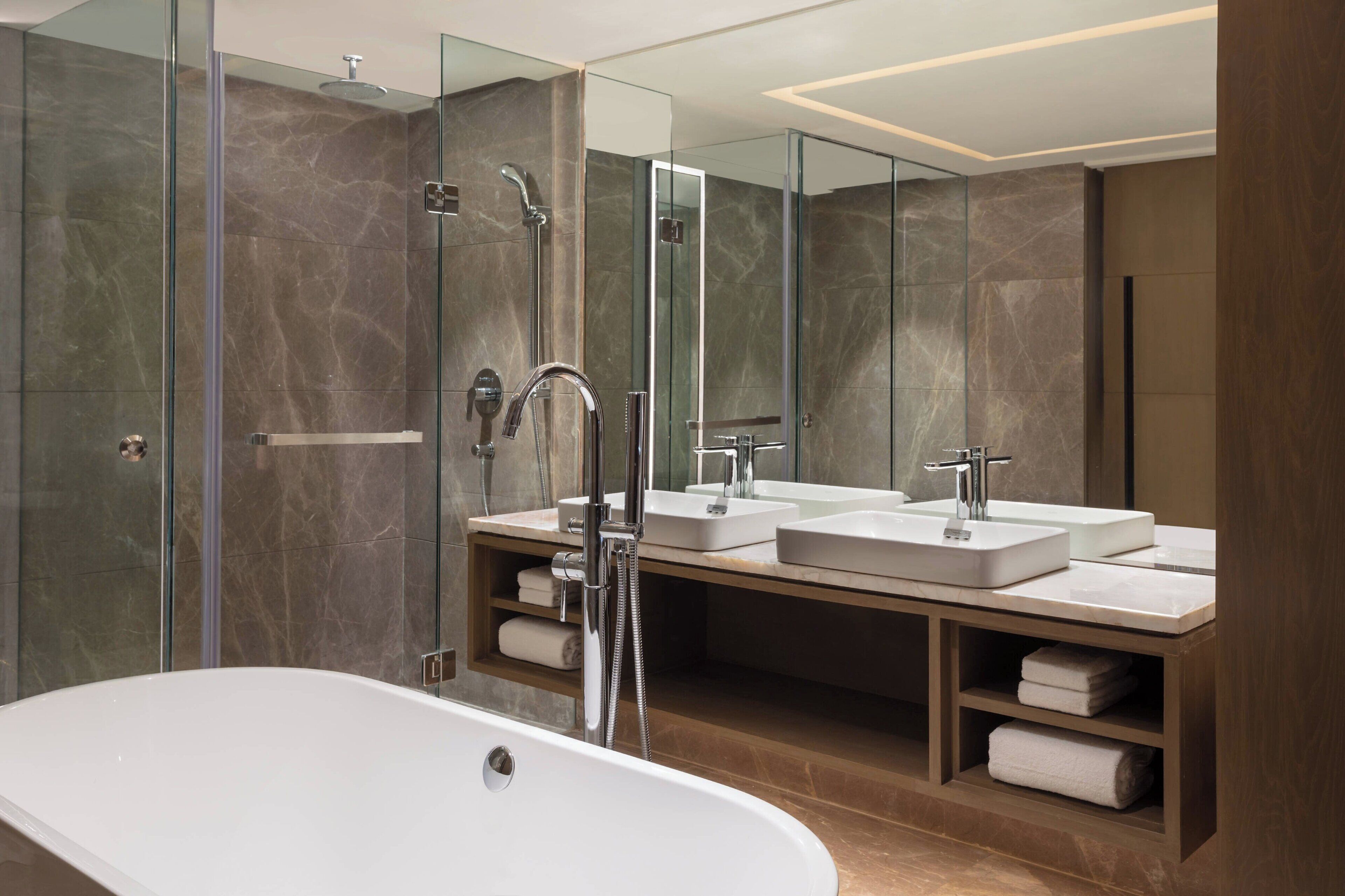 suite, 1 king bed | bathroom | shower, free toiletries, hair dryer, slippers