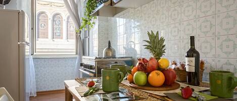 Microwave, oven, coffee/tea maker, dining tables