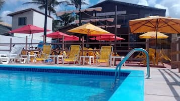 Outdoor pool, open 10:00 AM to 5:00 PM, pool umbrellas, pool loungers