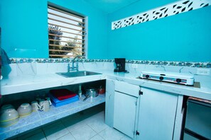 Fridge, microwave, stovetop, coffee/tea maker