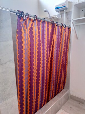 Shower, towels, soap, toilet paper