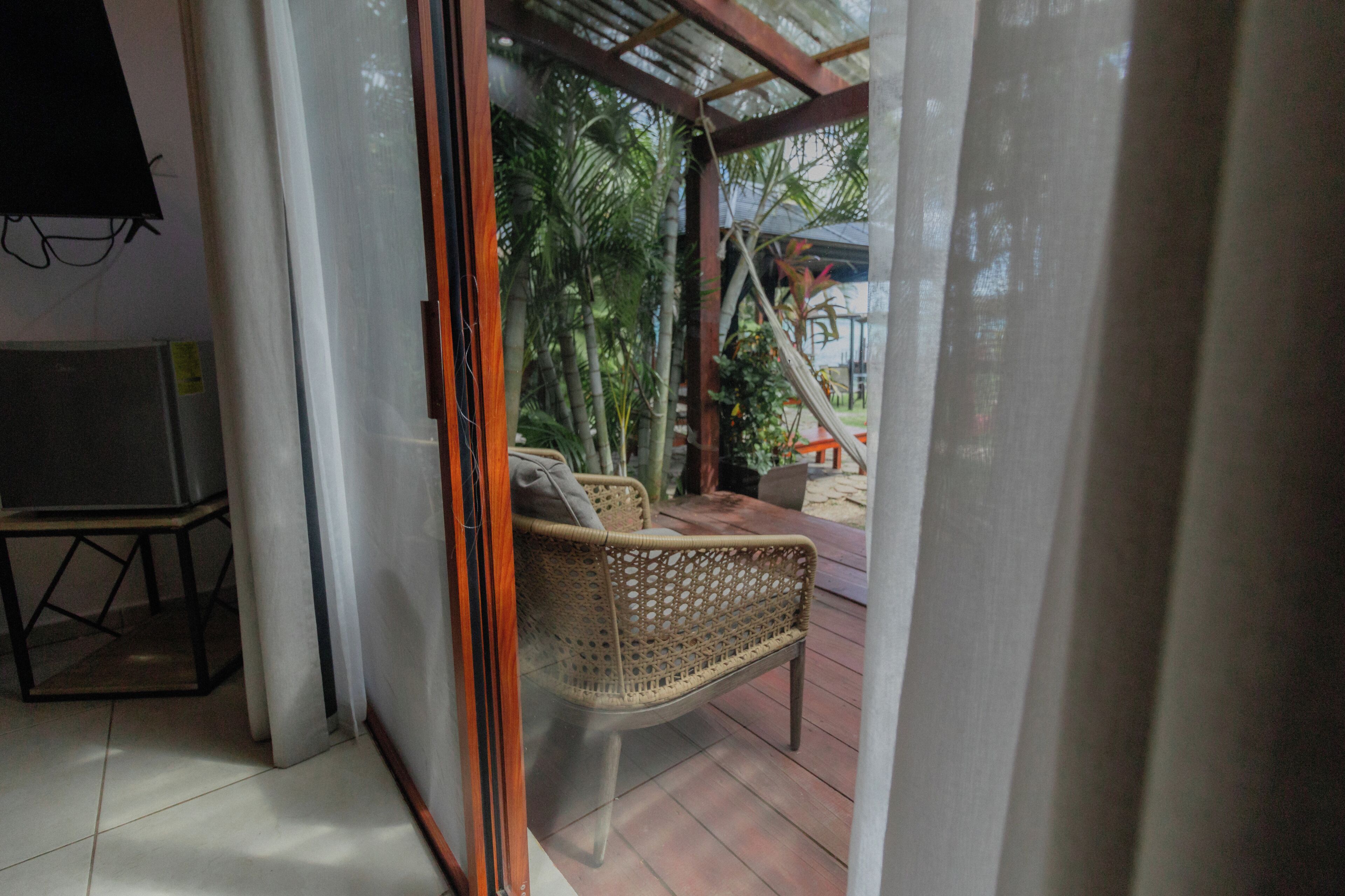 Cabaña Deluxe (Villa Paloma) | Caja de seguridad en la habitación, cortinas blackout y ropa de cama 