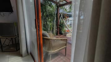 Cabaña Deluxe (Villa Paloma) | Caja de seguridad en la habitación, cortinas blackout y ropa de cama