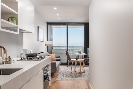Standard Apartment | Private kitchen | Fridge, microwave, oven, stovetop