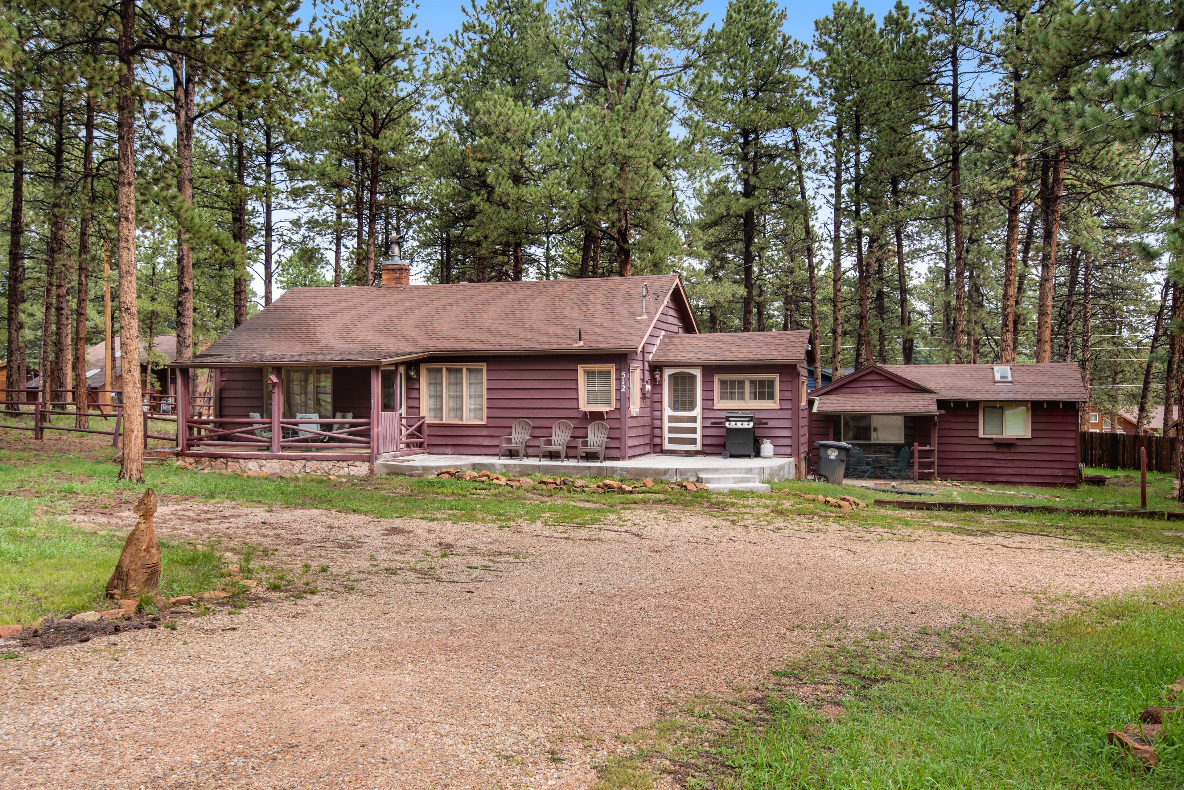Two-cabin property w/ spacious deck, fireplace & updated bathroom - dogs OK