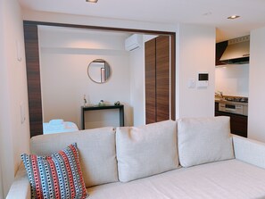 1 Bedroom 701 | Living area | Flat-screen TV