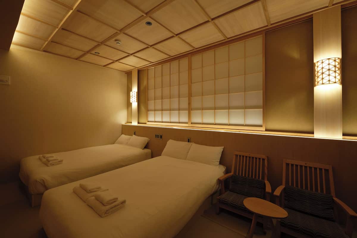 Quarto duplo design | Roupas de cama antialérgicas, camas Select Comfort, cofres nos quartos