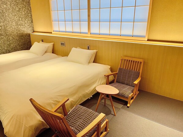 Chambre Design avec lits jumeaux | Literie hypoallergénique, lit avec matelas Select Comfort, coffre-fort