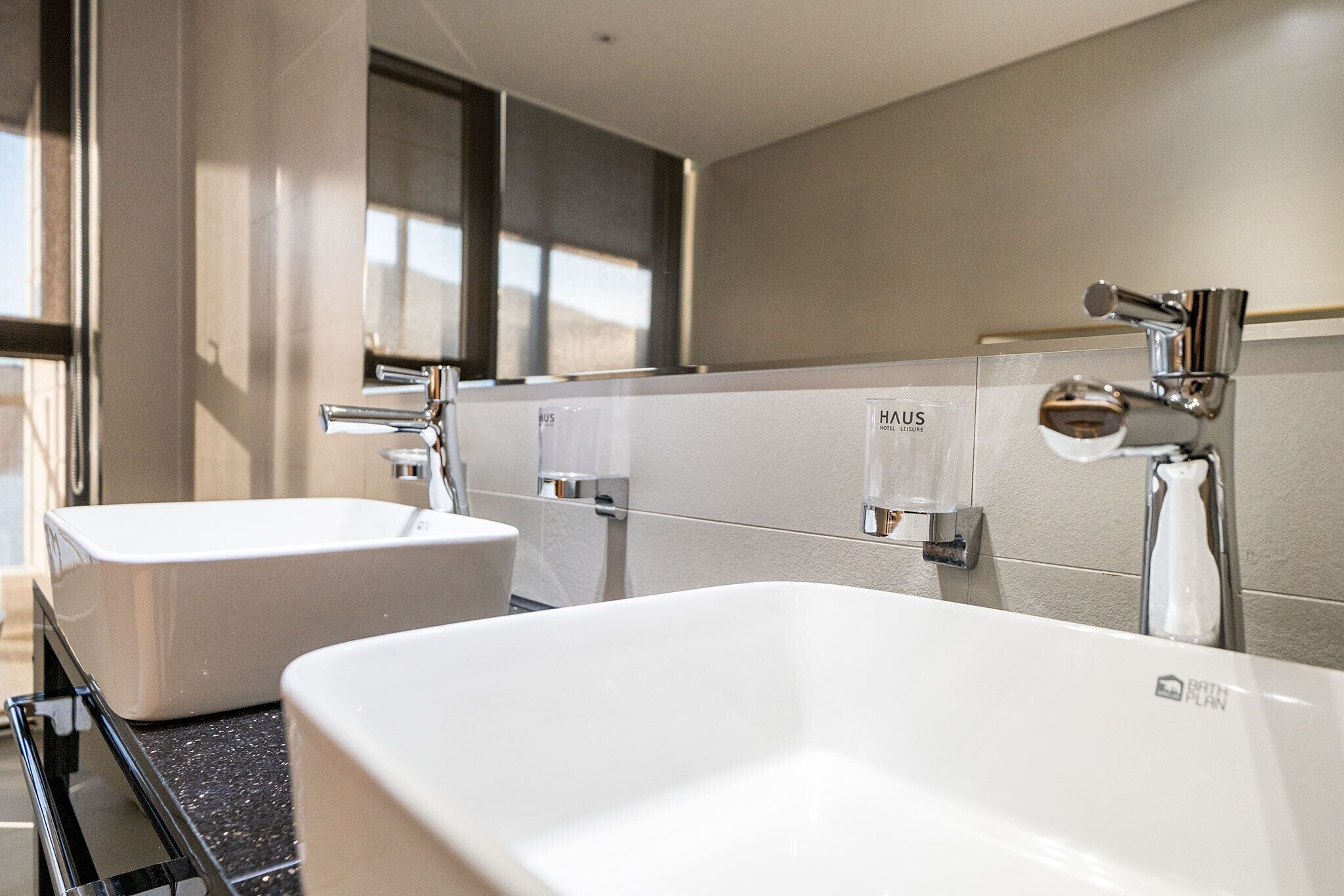 separate bathtub and shower, deep-soaking bathtub, rainfall showerhead