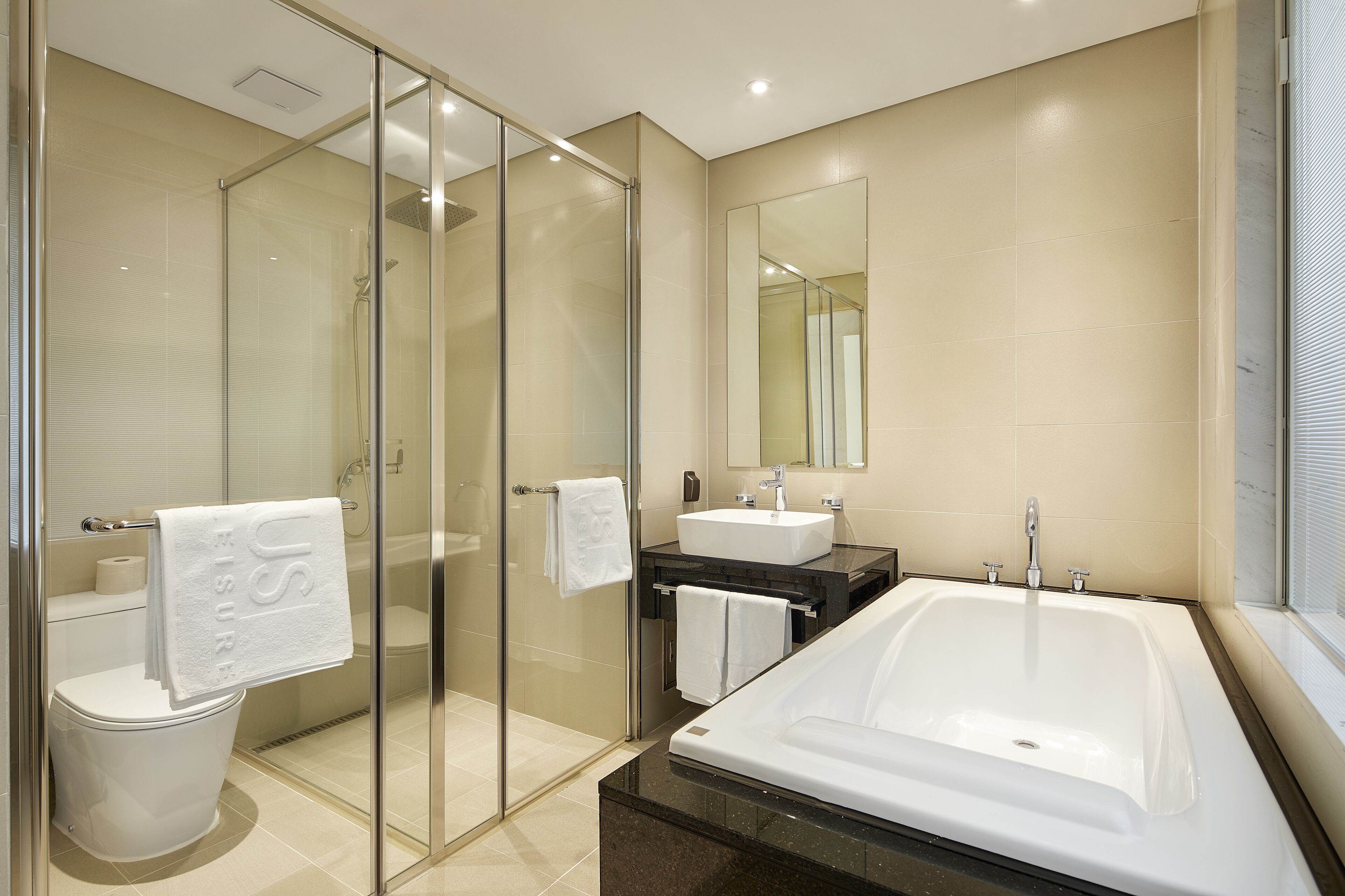 separate bathtub and shower, deep-soaking bathtub, rainfall showerhead