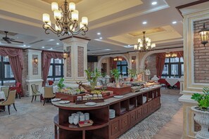Daily buffet breakfast (USD 15 per person)