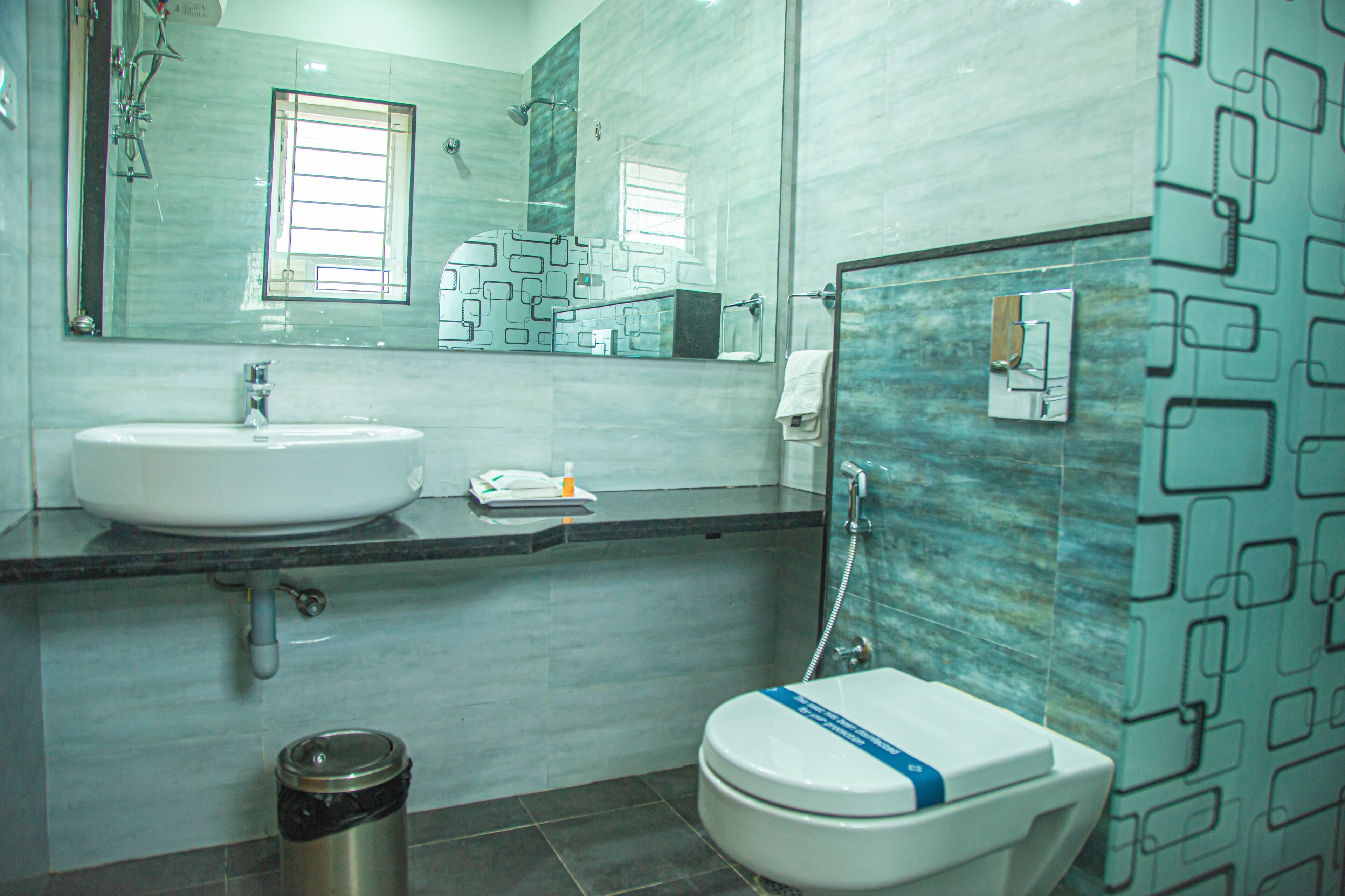 premium room | bathroom | shower, rainfall showerhead, free toiletries, towels