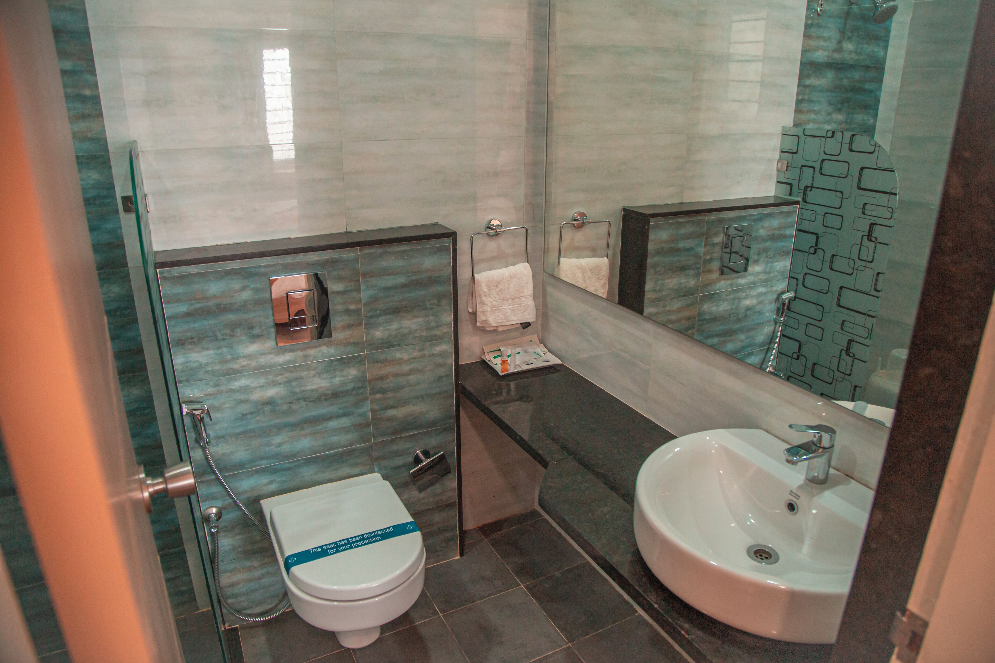 premium room | bathroom | shower, rainfall showerhead, free toiletries, towels