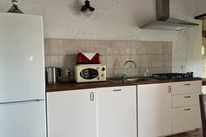 Fridge, microwave, coffee/tea maker, toaster