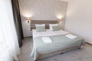 Premium bedding, down comforters, Select Comfort beds, minibar