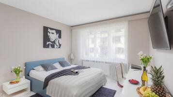 Junior appartement | 1 slaapkamer, een laptopwerkplek, een strijkplank/strijkijzer